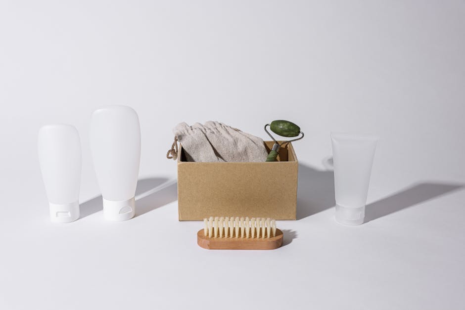 A minimalist arrangement of eco-friendly skincare products on a white surface.